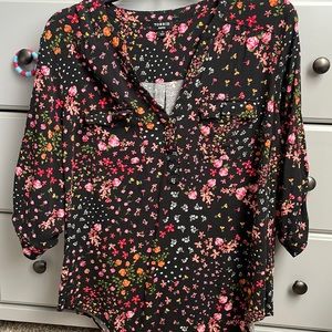 Floral Torrid “Harper” blouse.